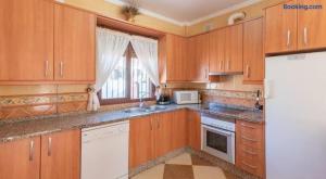 A kitchen or kitchenette at Villa Antonia