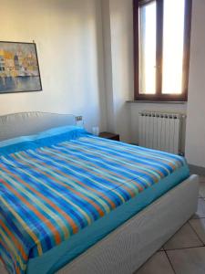Postelja oz. postelje v sobi nastanitve Appartamento Porticciolo