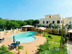 Bazén v ubytování Kreyol Krib Diani Beach nebo v jeho okolí