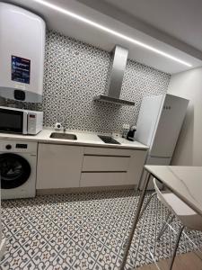 Kuchnia lub aneks kuchenny w obiekcie Astorga suites