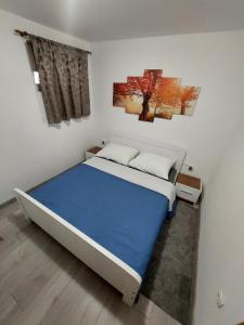 Postel nebo postele na pokoji v ubytování Guest House Neno