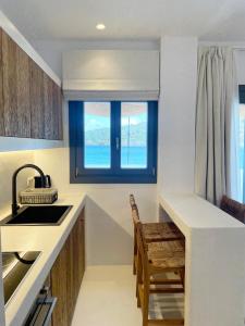 A kitchen or kitchenette at Faros Residences