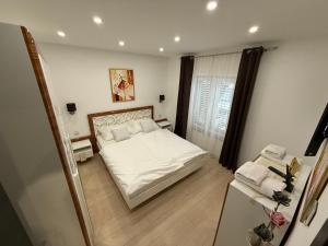 Postel nebo postele na pokoji v ubytování Apartment Goran