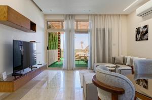 TV a/nebo společenská místnost v ubytování VESTA - New Cairo Residence