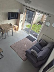 Posezení v ubytování Smaal apartment Beti