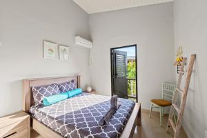 Postelja oz. postelje v sobi nastanitve Casa Bohemian Curacao