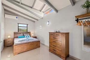 Postelja oz. postelje v sobi nastanitve Casa Bohemian Curacao