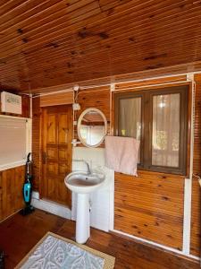 a bathroom with a sink and a mirror at Demre Lukka Bungalow in Demre +35 photos