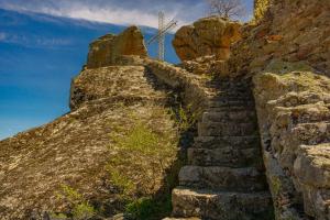 an old stone staircase on the side of a mountain at Solar Residence Rooms in Prilep