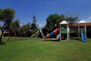 a playground with a slide and a swing at Funny Village Dog Friendly in Pizzo