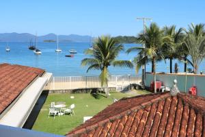 a view of a body of water with boats at Pousada do Contorno in Angra dos Reis +1 photo