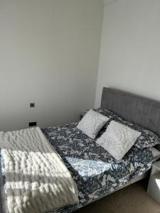 Un ou plusieurs lits dans un hébergement de l'établissement Kent Getaways