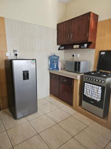 Η κουζίνα ή μικρή κουζίνα στο Sunset Haven Homes