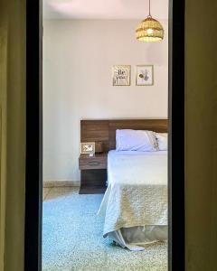Кровать или кровати в номере Hotel Herrera