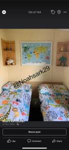 Postel nebo postele na pokoji v ubytování Caravan by the Sea C42