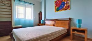 Postel nebo postele na pokoji v ubytování Island Escape - Blue Residence