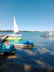 a group of boats sitting on the water at Sailor Apart Okuninka in Okuninka +16 photos