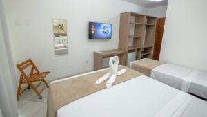 Postel nebo postele na pokoji v ubytování Hotel Beach Hills