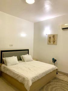 Ένα ή περισσότερα κρεβάτια σε δωμάτιο στο Melon Comfort +8 φωτογραφίες