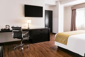 Voodi või voodid majutusasutuse Wyndham Costa del Sol Piura toas
