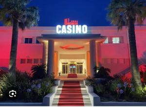 a view of the casina hotel at night at Brooklyn Studio Rose in Sanary-sur-Mer