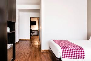 Voodi või voodid majutusasutuse Wyndham Costa del Sol Piura toas