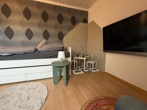 TV a/nebo společenská místnost v ubytování Lichtblick 2