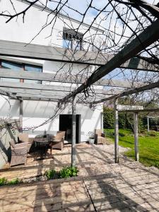 Vonkajšia záhrada v ubytovaní Apartamenty Miły - Gdynia Redłowo