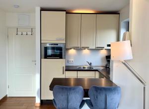 Η κουζίνα ή μικρή κουζίνα στο Appartementhaus Seemöwe Korallenmöwe