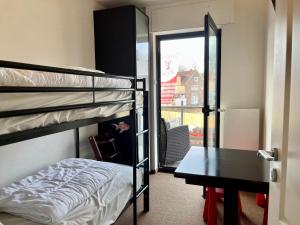 Ένα ή περισσότερα κρεβάτια σε δωμάτιο στο Appartementhaus Seemöwe Strandmöwe