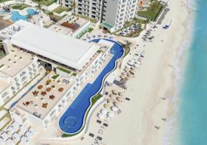 an aerial view of a resort and the beach at Emporio Cancun - Buy All Inclusive Option in Cancún