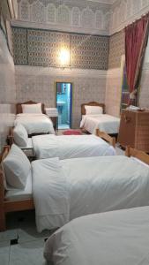 Postel nebo postele na pokoji v ubytování Riad Carole - Perfect for Families & Groups