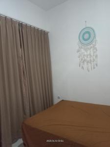 Ένα ή περισσότερα κρεβάτια σε δωμάτιο στο Fika Guesthouse