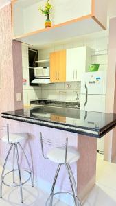 Nhà bếp/bếp nhỏ tại Rio Quente - Thermas Paradise Apto 1 QTO