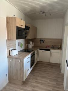 Dapur atau dapur kecil di Ferien-Apartement Kunz