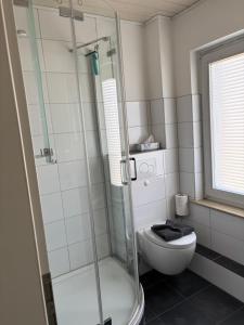 Bilik mandi di Ferien-Apartement Kunz