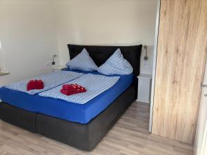 Katil atau katil-katil dalam bilik di Ferien-Apartement Kunz