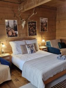Postel nebo postele na pokoji v ubytování Sękowa Chata, Zakopane, Domek