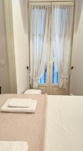 Letto o letti in una camera di Quarto Com Banheiro no Coração de Lisboa