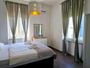 Posteľ alebo postele v izbe v ubytovaní Apartment Zoey