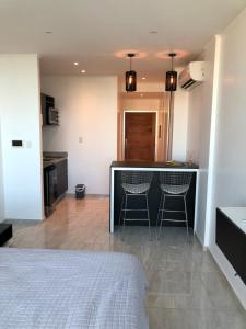 En eller flere senge i et værelse på charlotte belgrano suite