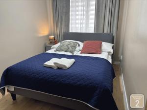 Posteľ alebo postele v izbe v ubytovaní Apartamenty Przy Deptaku w Radomiu