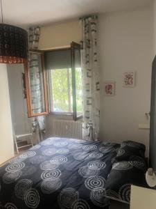 Postel nebo postele na pokoji v ubytování Enea Guest House
