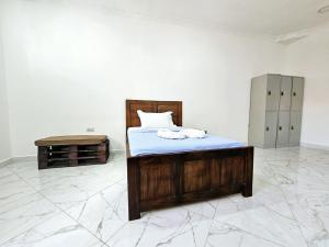 Ένα ή περισσότερα κρεβάτια σε δωμάτιο στο Hello Rafiki House - Stonetown