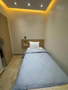 Letto o letti in una camera di Landmark Hostel Cairo