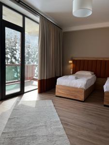 Postel nebo postele na pokoji v ubytování Kakhri Resort