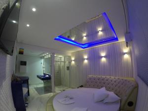 TV a/nebo společenská místnost v ubytování Motel Glamour