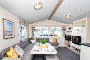 Posezení v ubytování 3Bedroom Caravan Seton Sands
