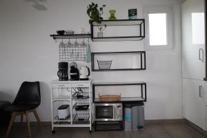 Kuchyň nebo kuchyňský kout v ubytování Apartma Javoršček