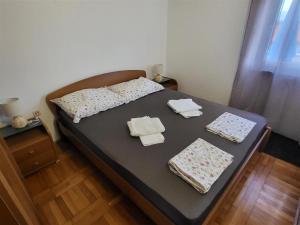 Ένα ή περισσότερα κρεβάτια σε δωμάτιο στο Apartments Oli Soline